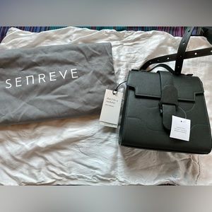 Senreve Alunna Bag- Pebbled Forest Green. Versatile strap to wear in many ways